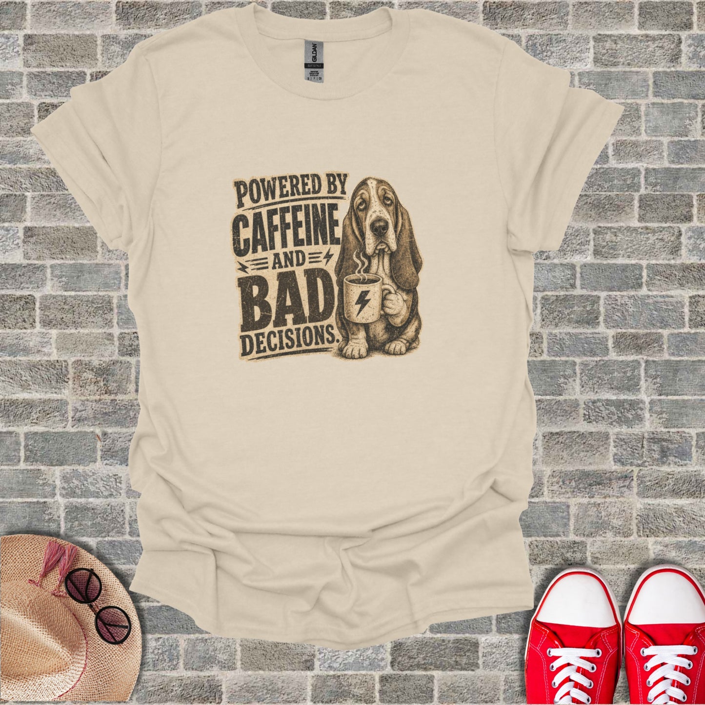 Basset hound with coffee mug and text "POWERED BY CAFFEINE AND BAD DECISIONS."