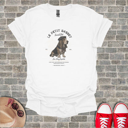 White t-shirt with "Le Petit Basset Social Club" and a dog graphic.