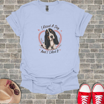 Light blue t-shirt with "I Kissed A Dog And I Liked It" and a dog graphic.