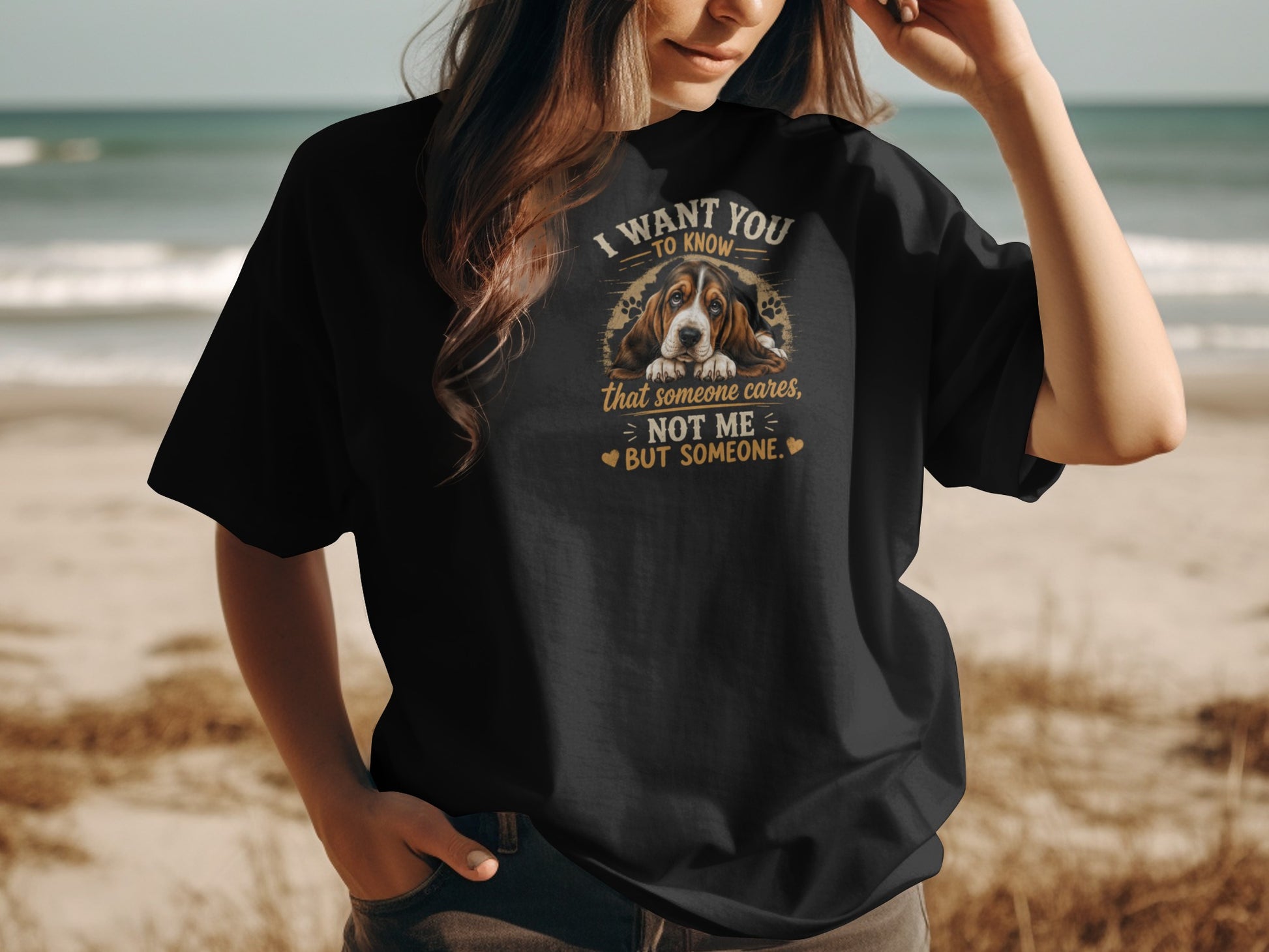 Black t-shirt with Basset Hound graphic and text "I want you to know that someone cares, not me - but someone."