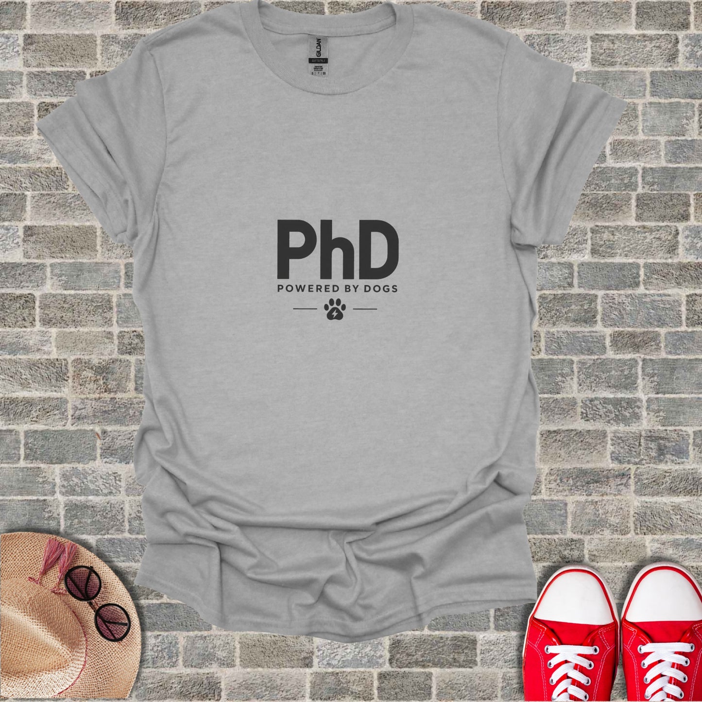 Grey t-shirt with "PhD POWERED BY DOGS" and a paw print logo.