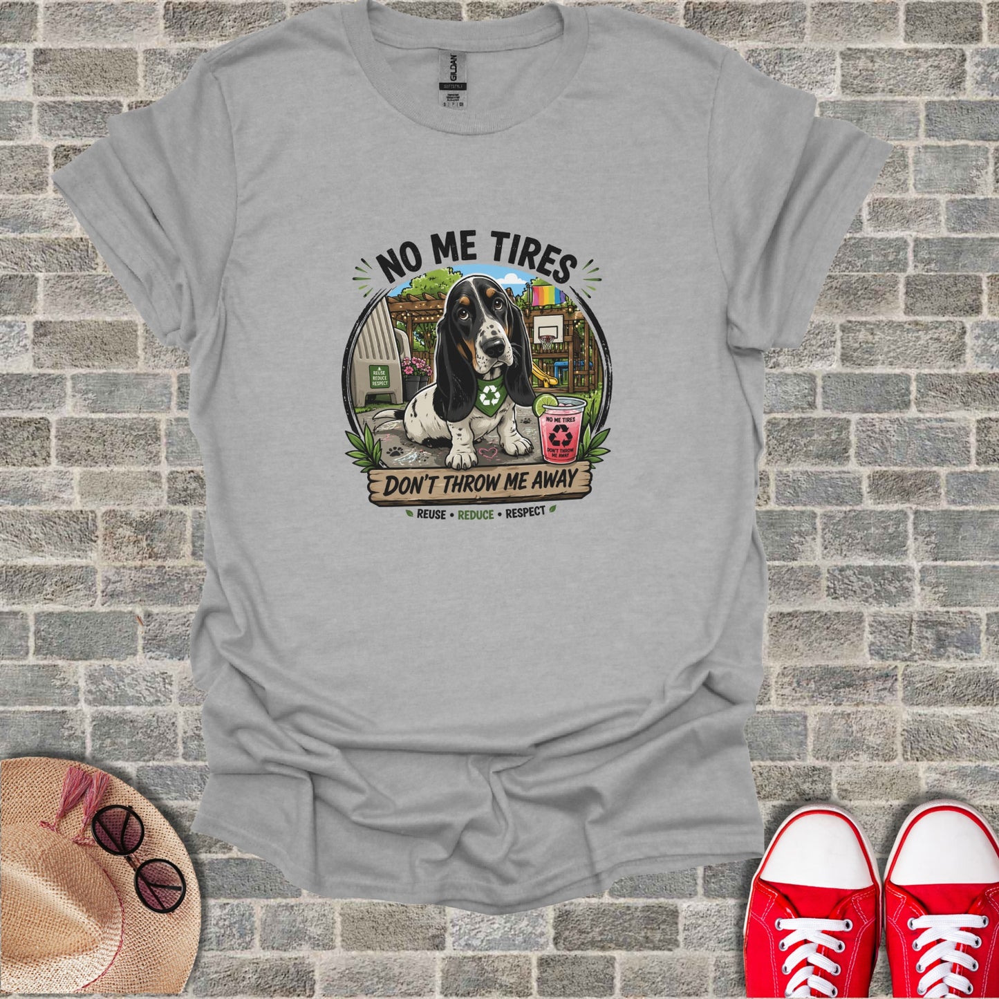 T-shirt with Basset Hound and recycling symbols, reads "No Me Tires" and "Don't Throw Me Away."