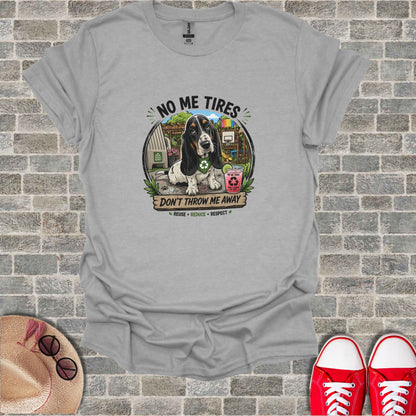 T-shirt with Basset Hound and recycling symbols, reads "No Me Tires" and "Don't Throw Me Away."