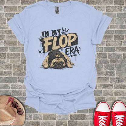 Light blue t-shirt with a pug wearing a beanie and "In My Flop Era" text.