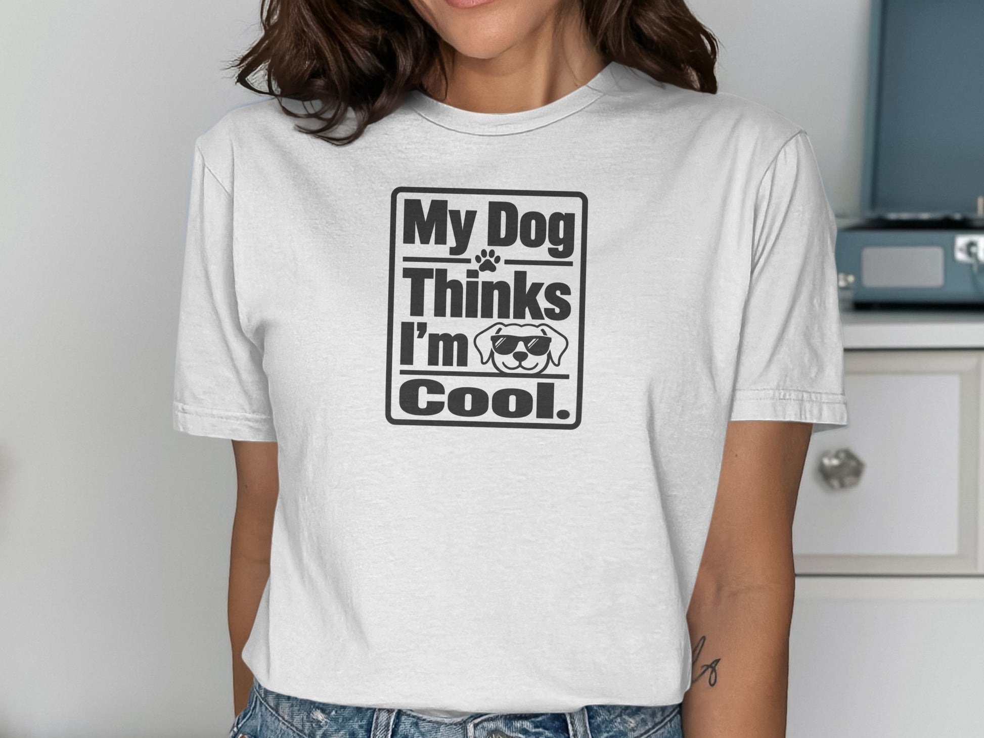 Black graphic tee with "My Dog Thinks I'm Cool." text and sunglasses-wearing dog.