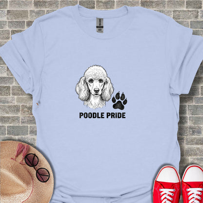 Light blue t-shirt with black poodle head sketch and paw print logo.