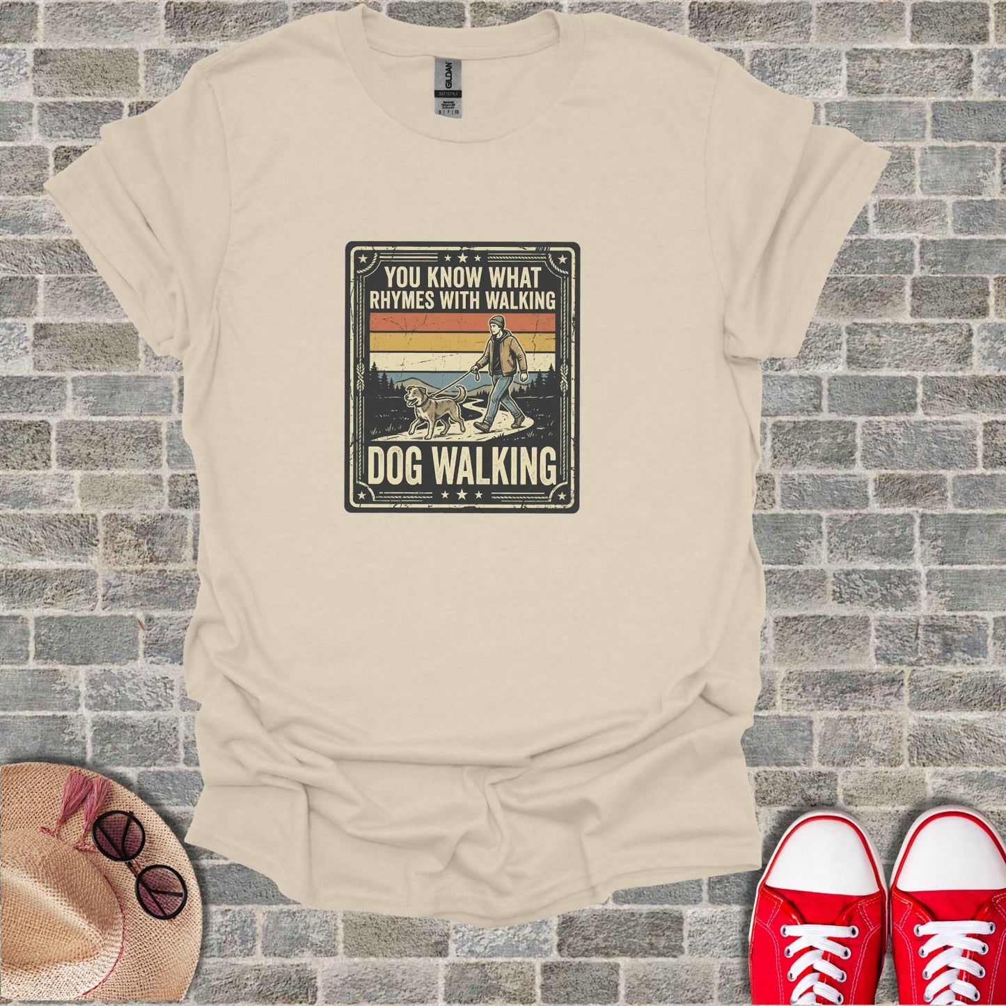 Cream t-shirt with "Dog Walking" graphic, featuring a man and dog.