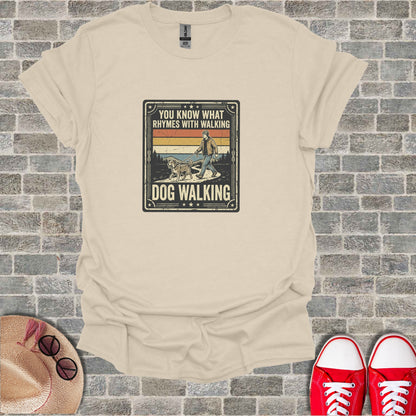 Cream t-shirt with "Dog Walking" graphic, featuring a man and dog.