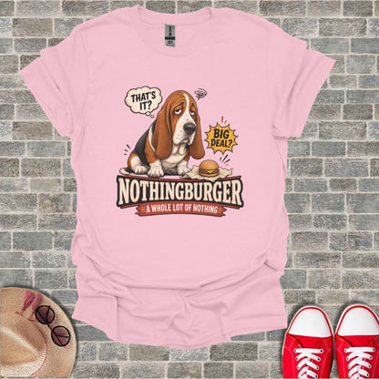 Pink t-shirt with a cartoon basset hound and text "NOTHINGBURGER A WHOLE LOT OF NOTHING".