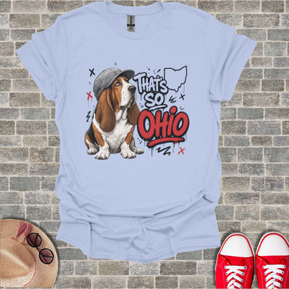 Basset hound wearing a baseball cap with "THAT'S SO OHIO" graphic.