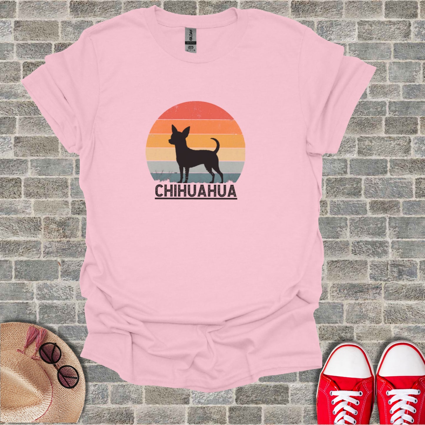 Pink t-shirt with a black chihuahua silhouette and "CHihuahua" text.
