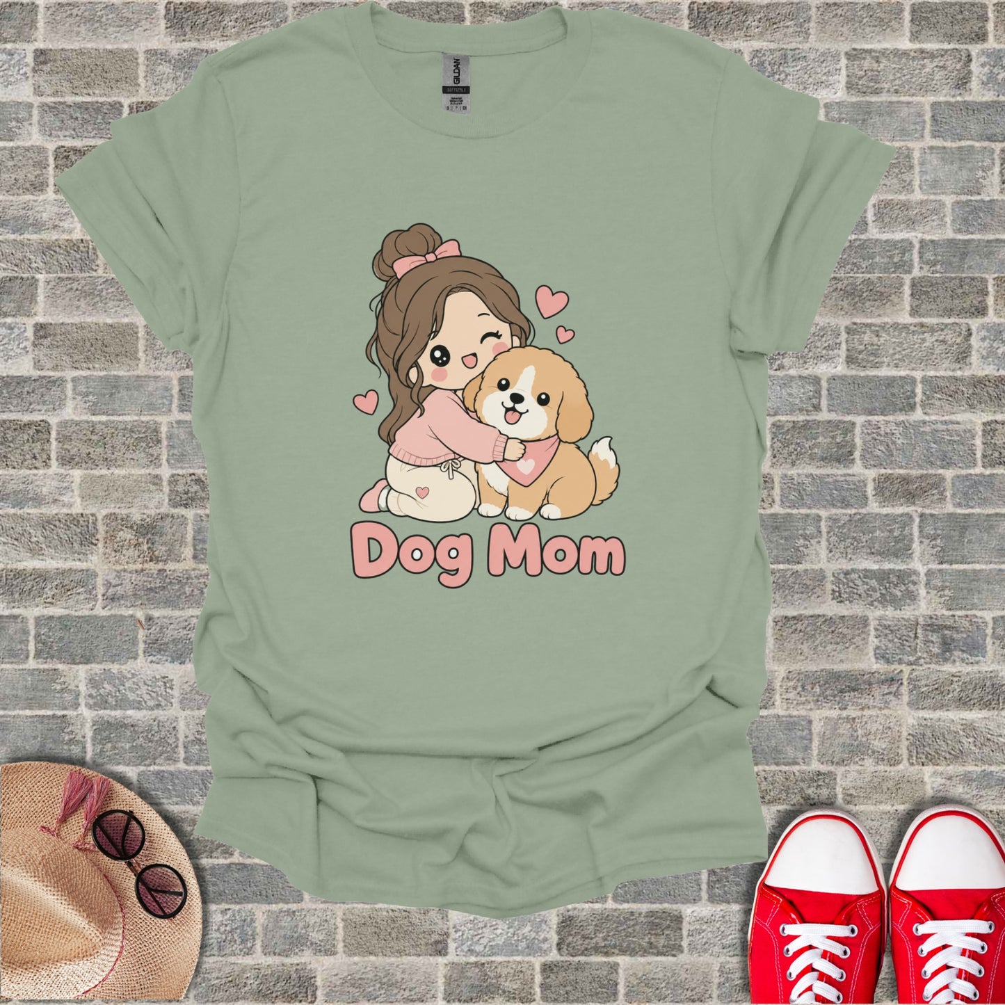 Girl hugging a dog with "Dog Mom" text on a light green t-shirt.
