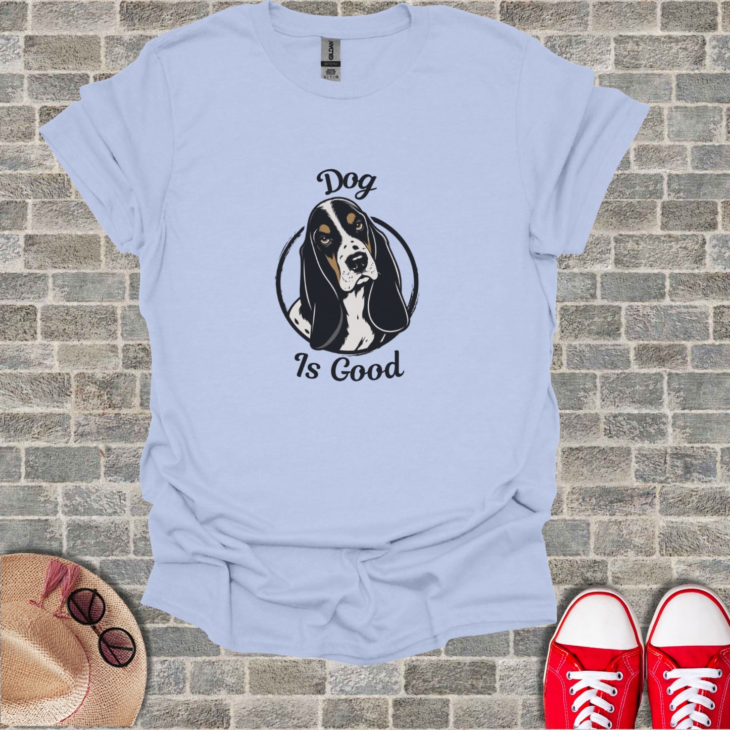Light blue t-shirt with "Dog Is Good" text and a Basset Hound graphic.