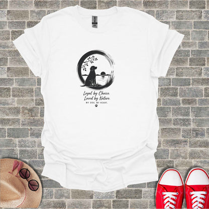 White t-shirt with silhouette of dog and sunset, text "Loyal by Choice. Loved by Nature."
