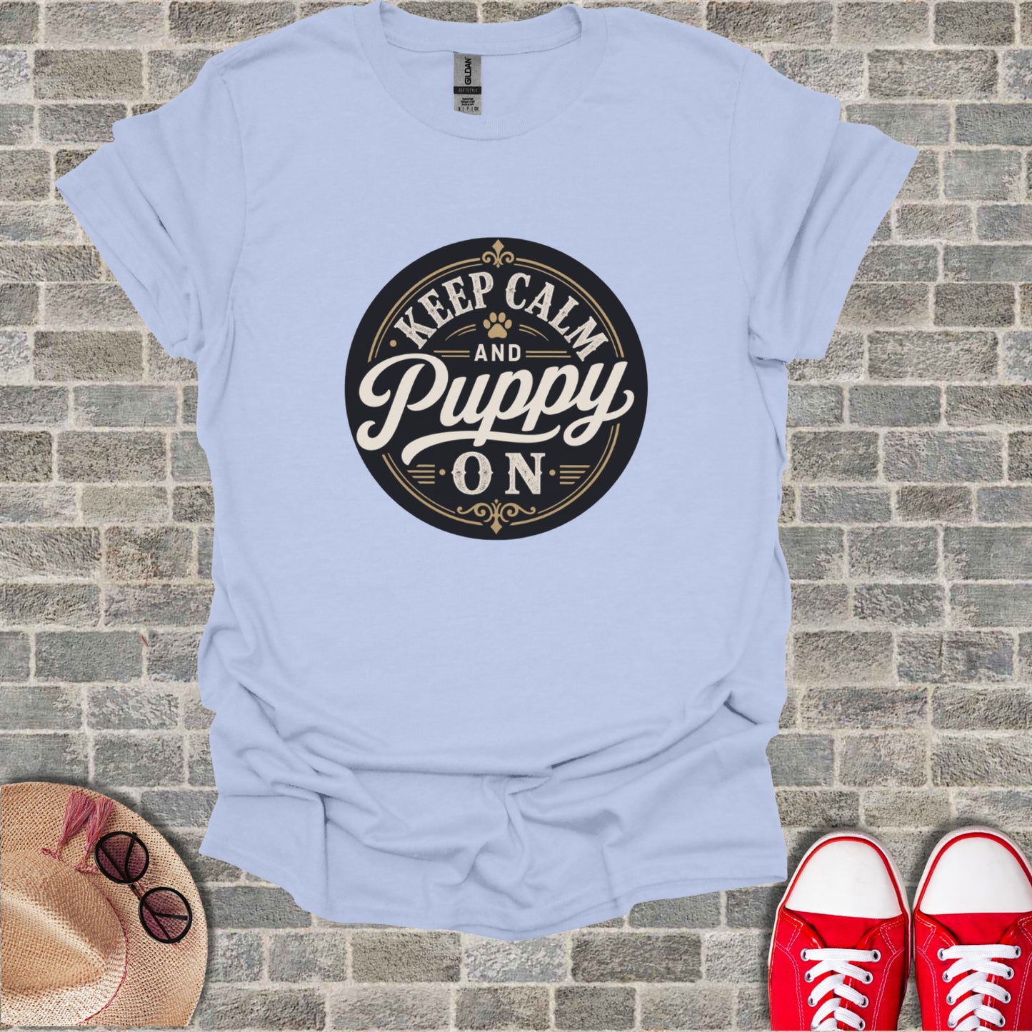 Light blue t-shirt with "Keep Calm and Puppy On" graphic.