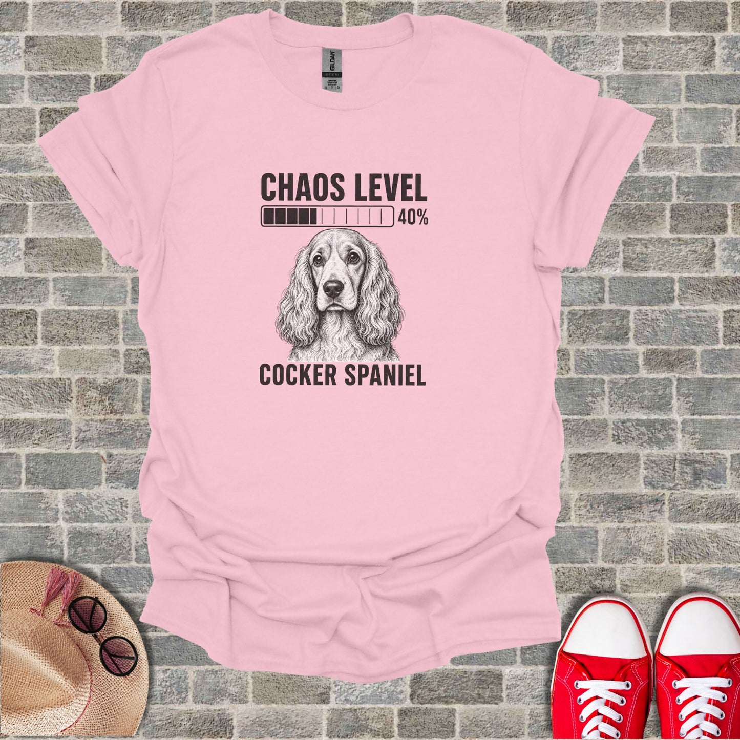 Pink t-shirt with Cocker Spaniel graphic and "Chaos Level 40%" text.