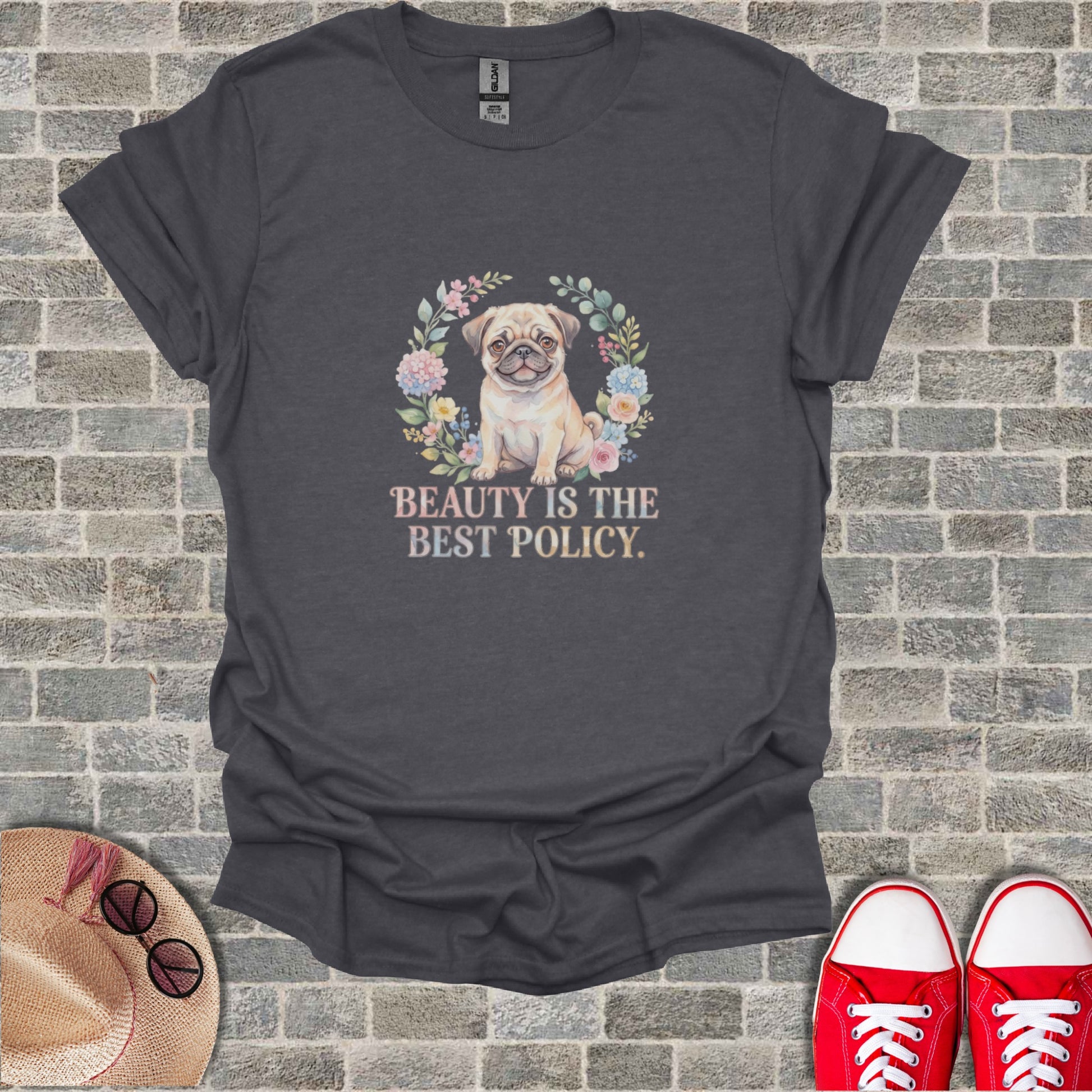 Watercolor pug wearing a floral wreath, text reads "Beauty is the best policy."