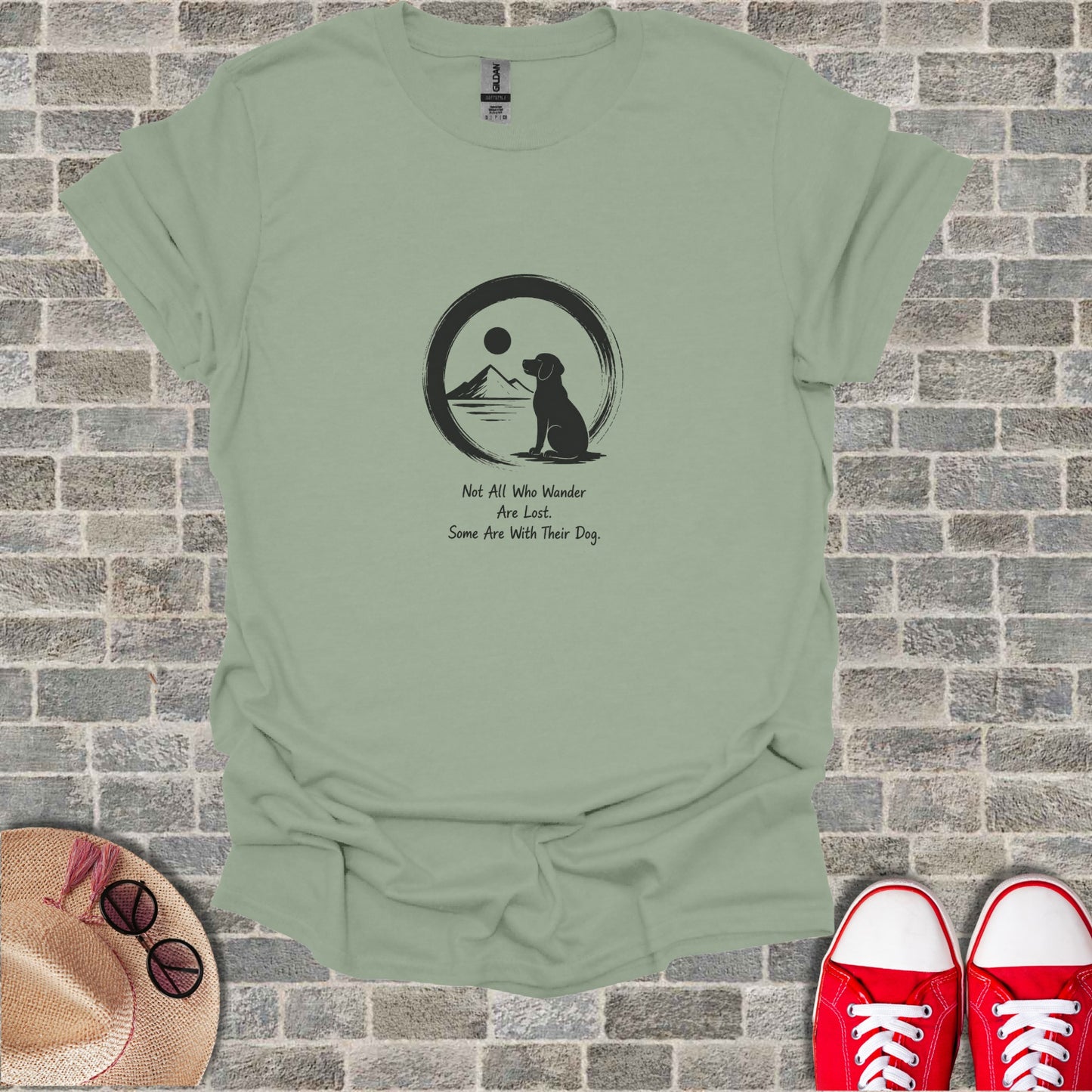 T-shirt with dog, sun, moon, and quote: "Not All Who Wander Are Lost. Some Are With Their Dog."