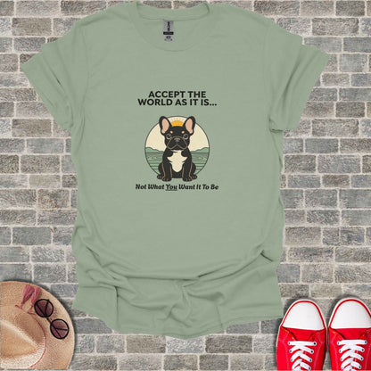 French bulldog sitting with "Accept the world as it is..." text.