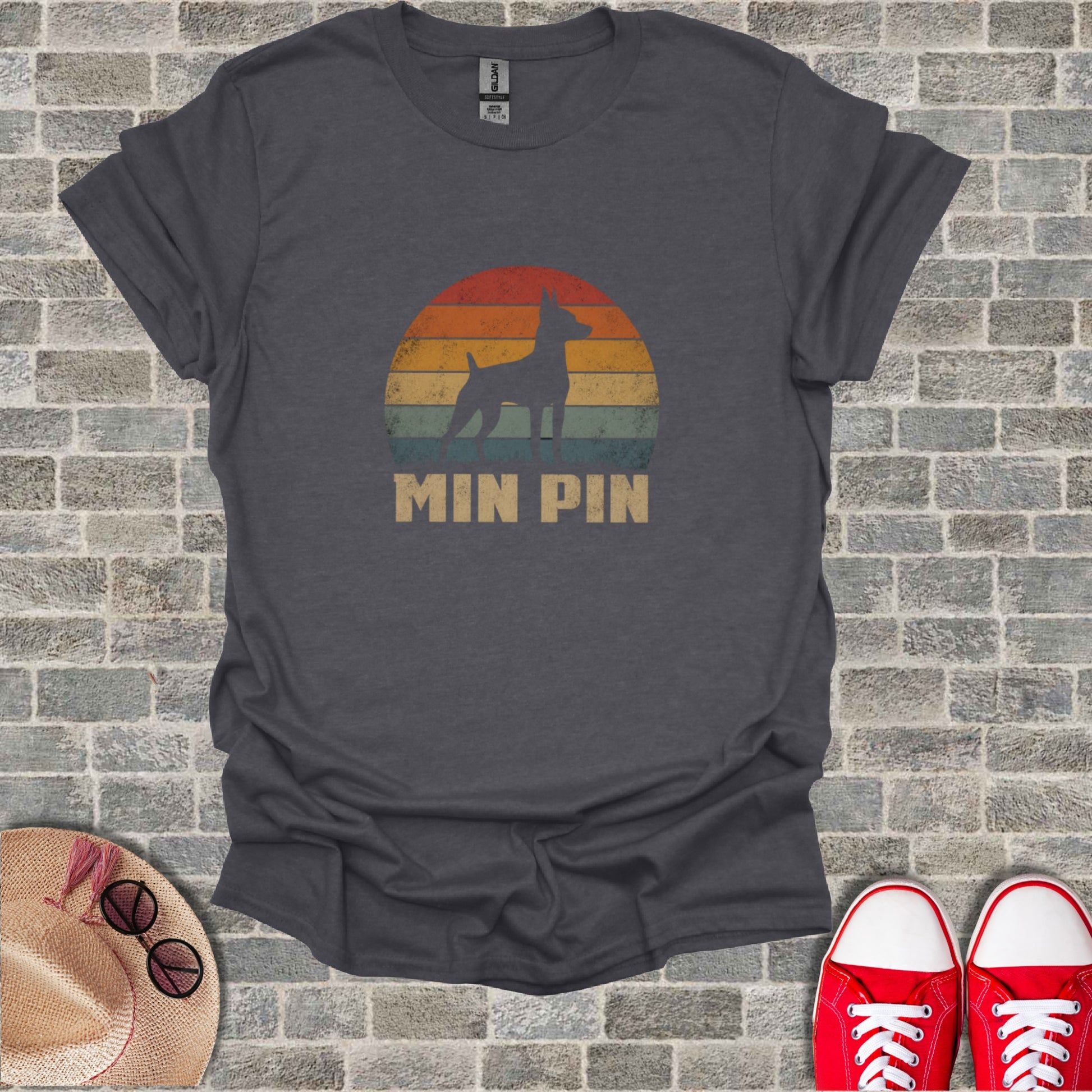 Vintage sunset graphic with "MIN PIN" text on charcoal t-shirt.