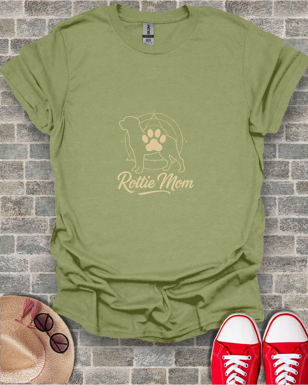 Olive green t-shirt with a Rottweiler silhouette and "Rottie Mom" text.