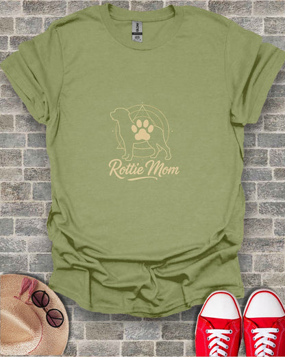 Olive green t-shirt with a Rottweiler silhouette and "Rottie Mom" text.