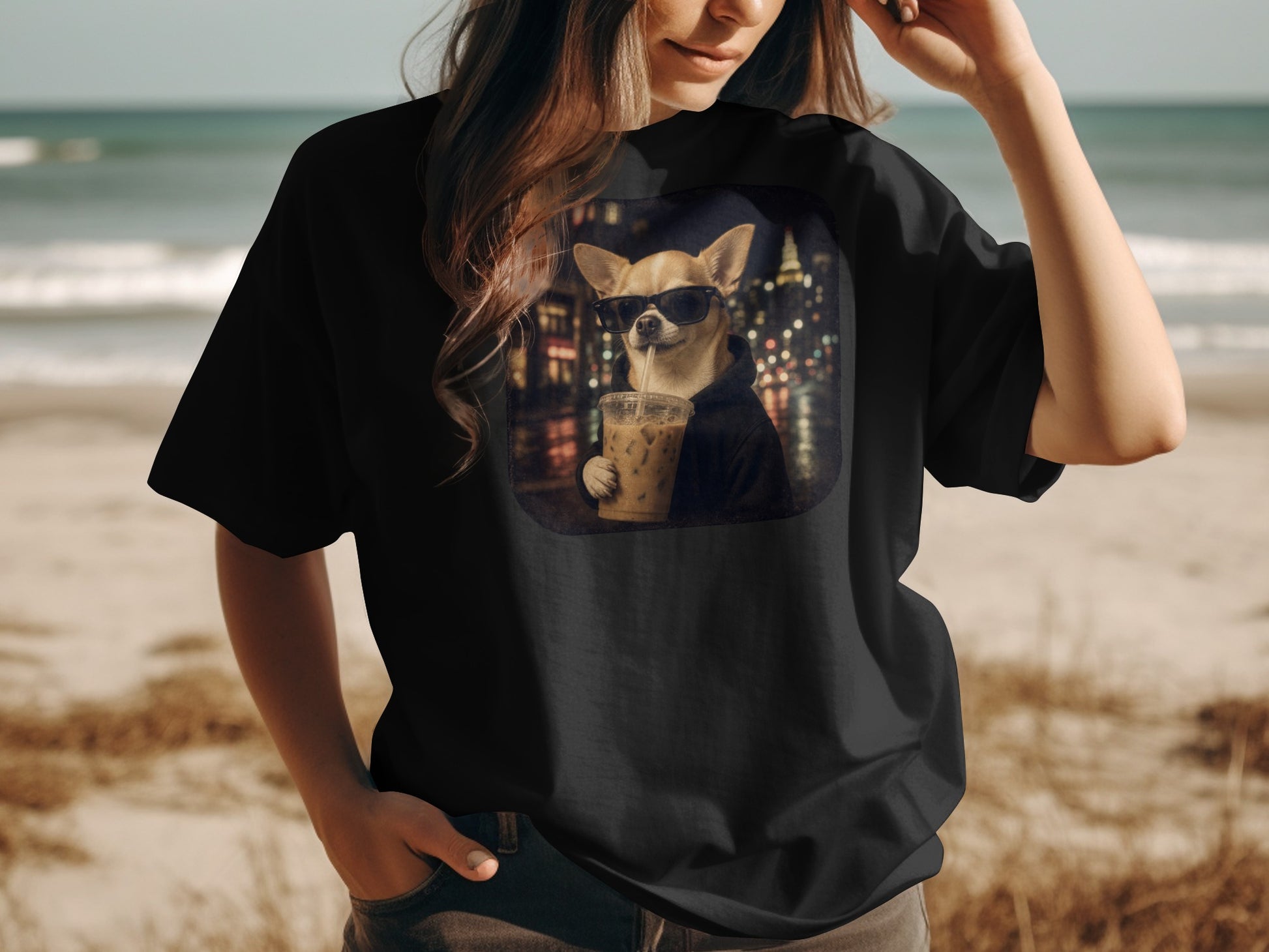 Chihuahua wearing sunglasses drinks iced coffee with city lights at night.