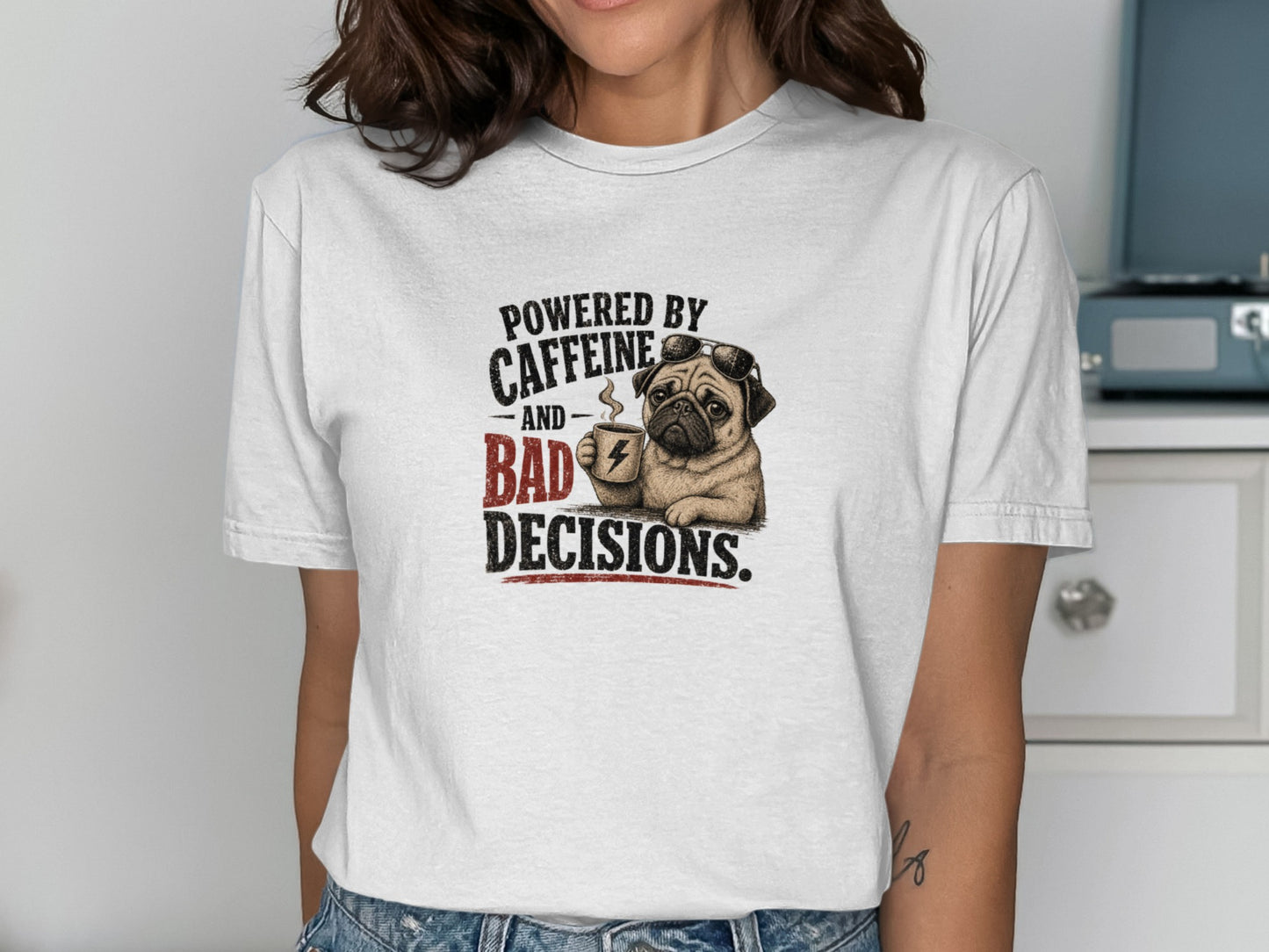 Pug wearing goggles holding coffee mug with text "POWERED BY CAFFEINE AND BAD DECISIONS."