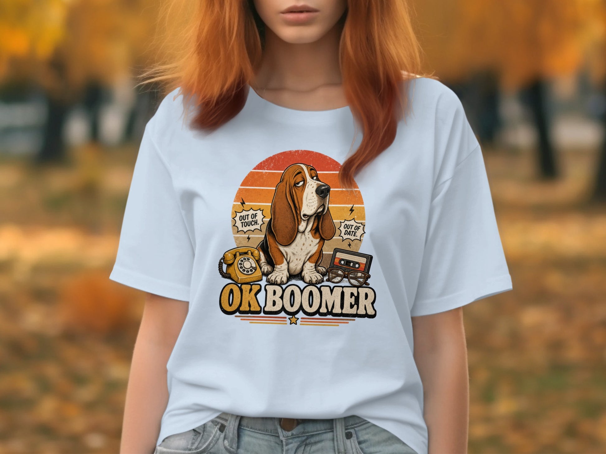 T-shirt graphic with "OK BOOMER" and retro items: rotary phone, cassette tape.