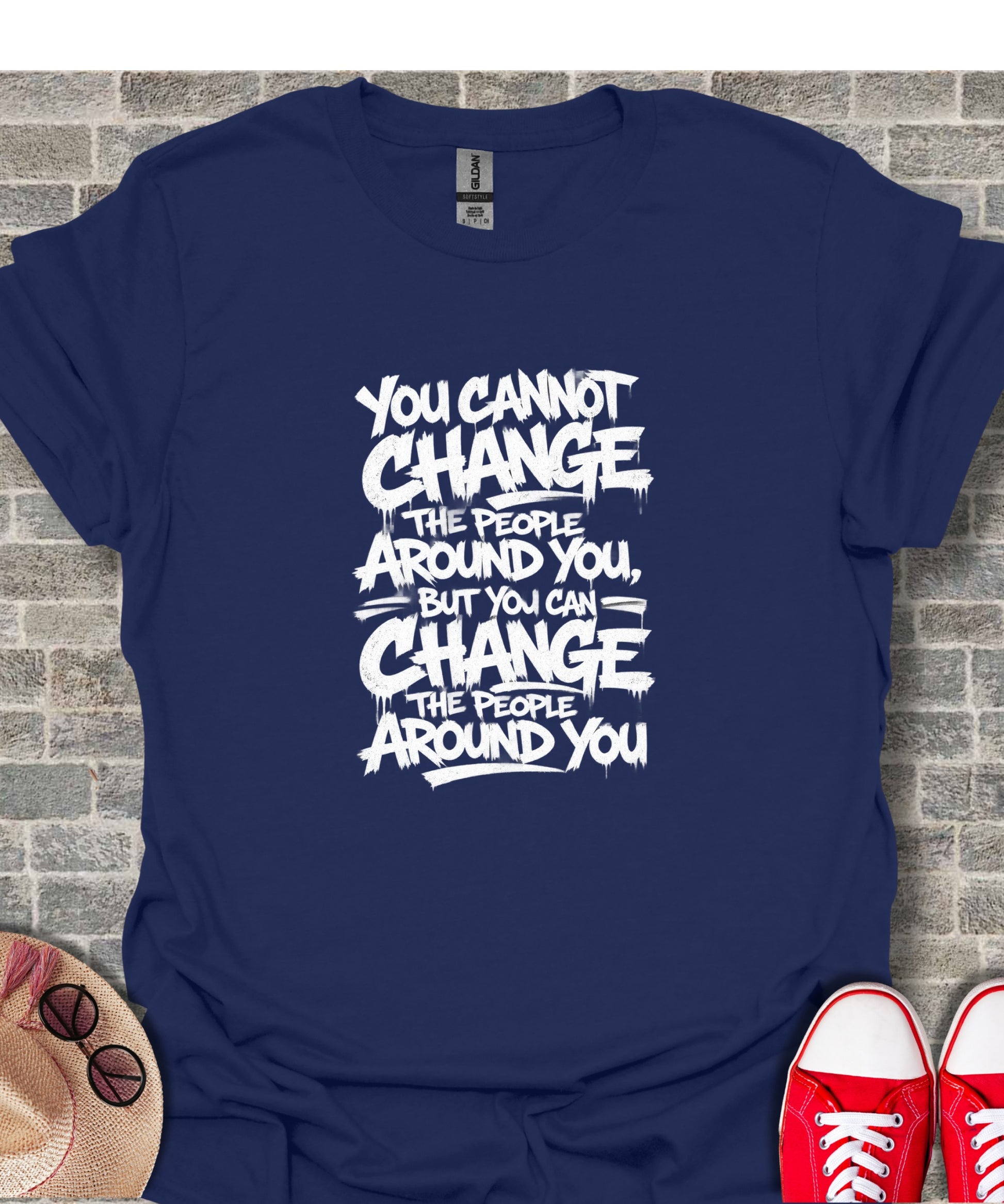 Navy t-shirt with white text reading "You cannot change the people around you, but you can change the people around you."
