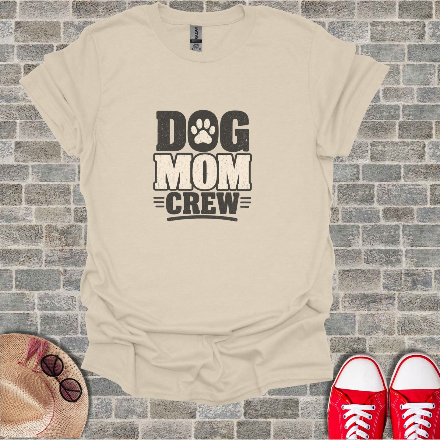 Cream t-shirt with "Dog Mom Crew" text and paw print design.