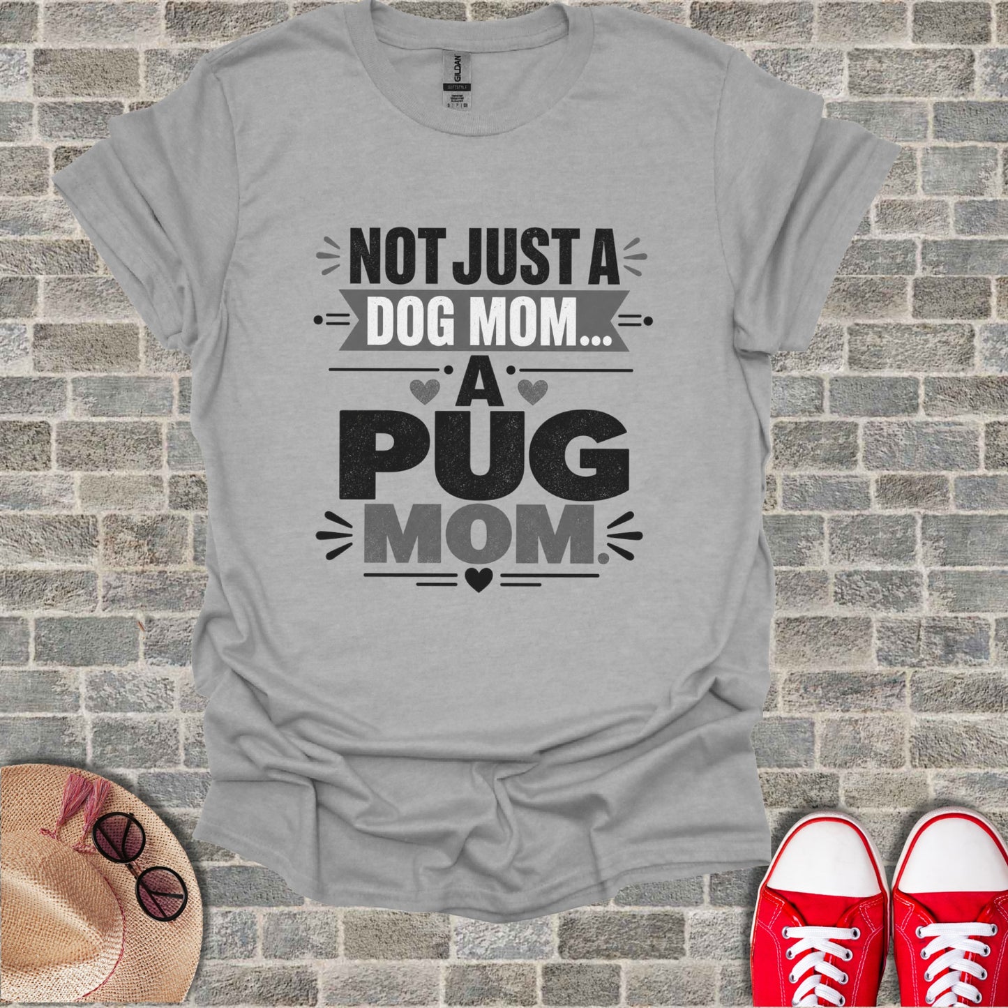 Grey t-shirt with the text "Not just a dog mom... A pug mom"