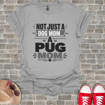 Grey t-shirt with the text "Not just a dog mom... A pug mom"