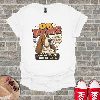 White t-shirt with "OK Boomer" cartoon dog, "out of touch, out of date" text.