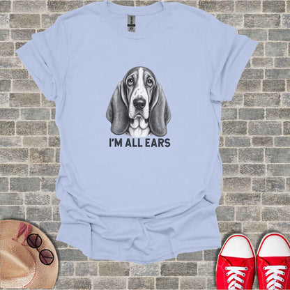 Light blue t-shirt with black and white sketch of a Basset Hound and text "I'M ALL EARS".