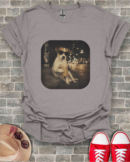 Jack Russell terrier wearing sunglasses drinks from iced coffee on a city street