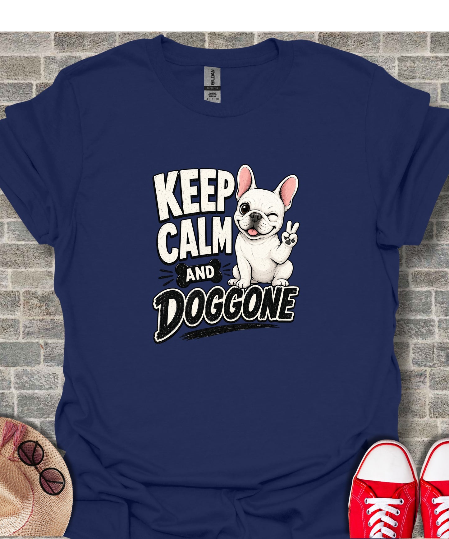 French Bulldog wearing a t-shirt that says "Keep Calm and Doggone".