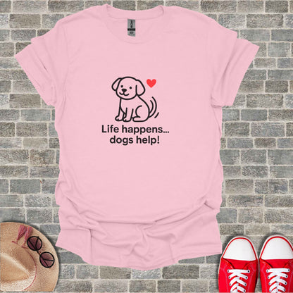Pink t-shirt with dog and heart graphic, text "Life happens... dogs help!".