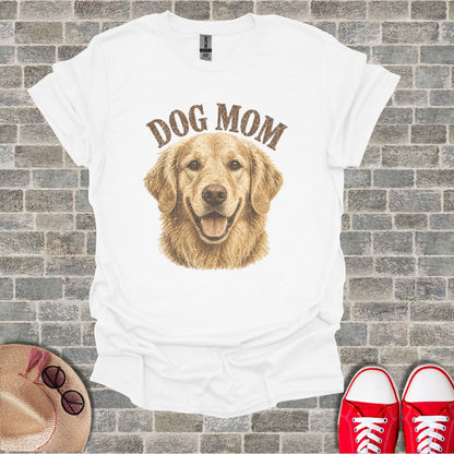 White t-shirt with golden retriever and "DOG MOM" text.