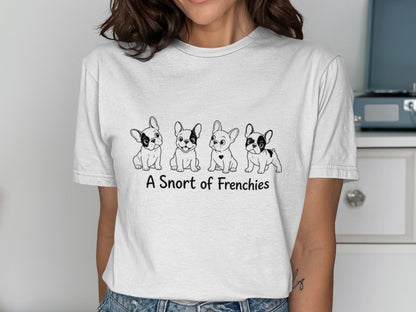 White t-shirt with four French bulldog illustrations and the text "A Snort of Frenchies".