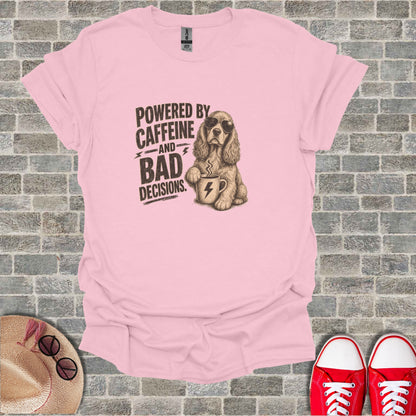 Pink t-shirt with "Powered by Caffeine and Bad Decisions" text and a dog drinking coffee.