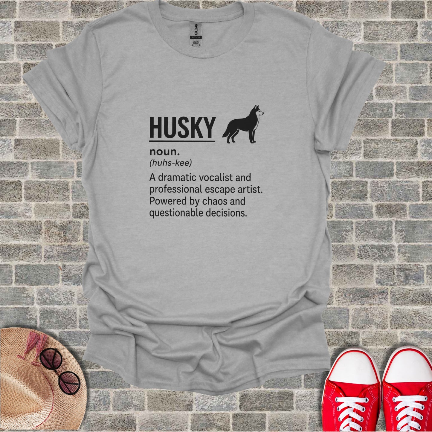 Gray t-shirt with "HUSKY" text, husky silhouette, and definition.