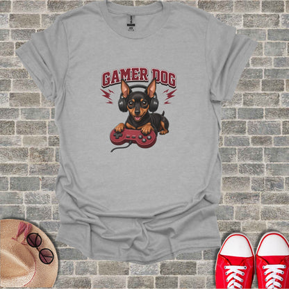 T-shirt graphic of a Chihuahua wearing headphones and holding a video game controller.