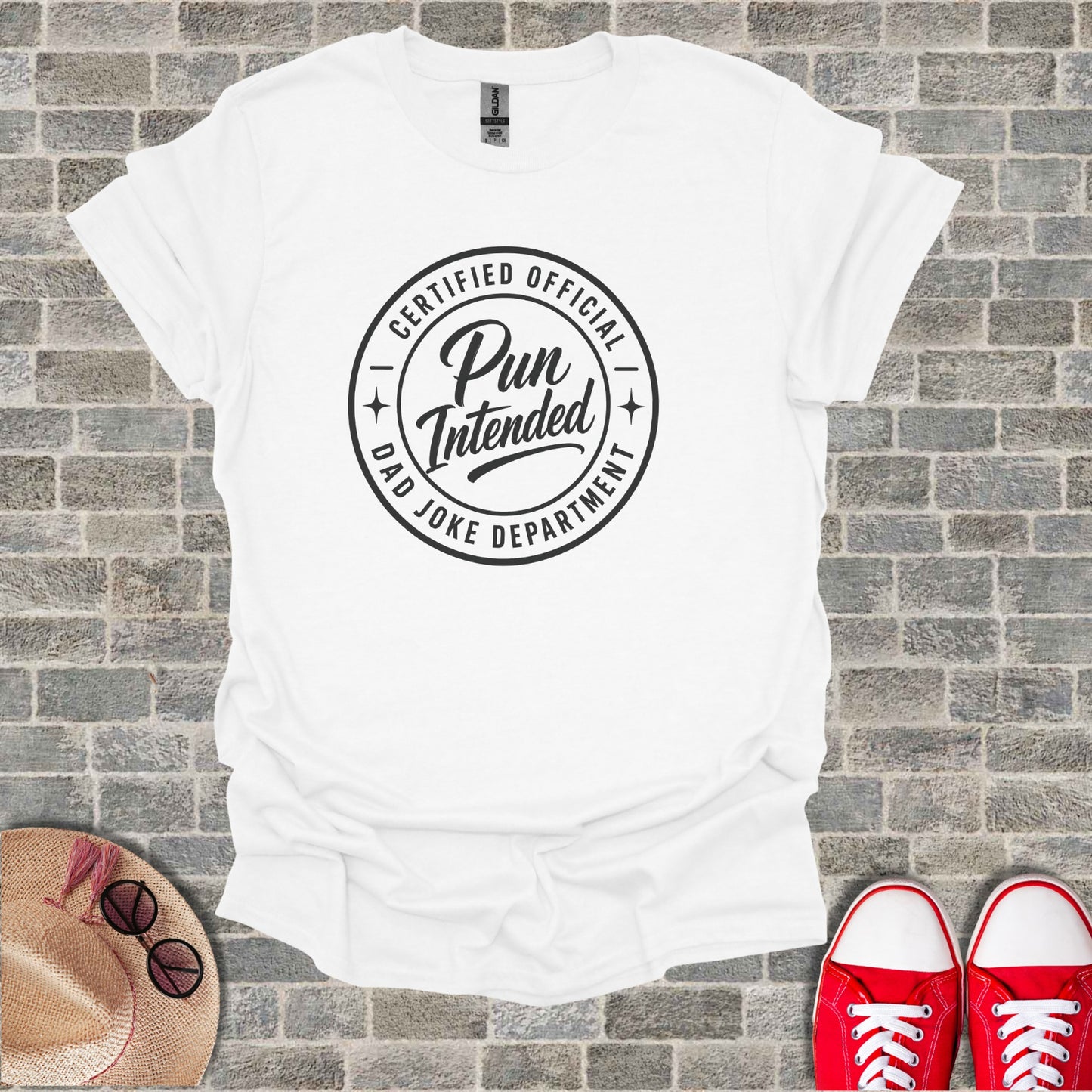 White t-shirt with "Certified Official Pun Joke Department" graphic.
