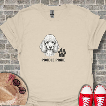 Cream t-shirt with a black poodle and paw print graphic and text.