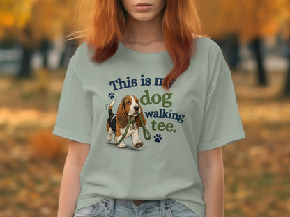 Basset hound on shirt with text "This is my dog walking tee."