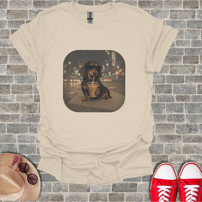 T-shirt featuring a dachshund wearing sunglasses drinking iced coffee at night.