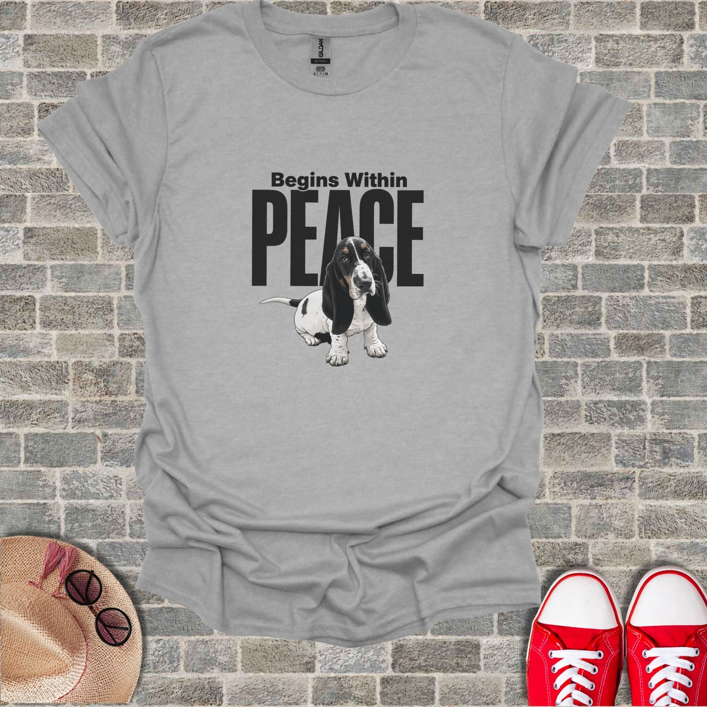 T-shirt with a basset hound and text "Begins Within PEACE".