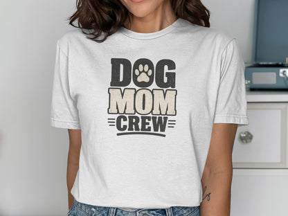 White t-shirt with "DOG MOM CREW" text and paw print graphic.