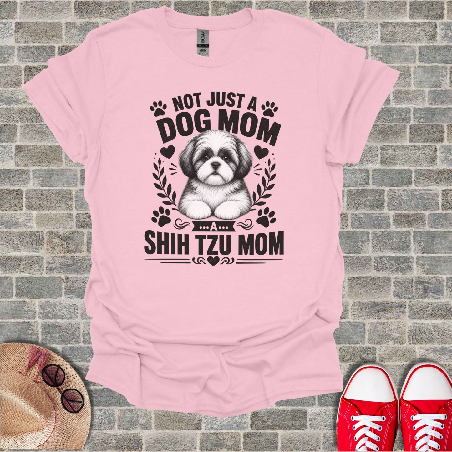 Pink t-shirt with black text and Shih Tzu graphic: "Not just a dog mom, a Shih Tzu mom."